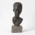 Patinated ceramic bust on a stone base. This piece has an attribution mark, I am sure that it is completely authentic and...