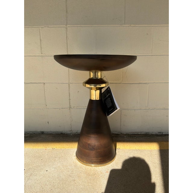 Stylish Hooker Furniture Side table. Dark Brown finish with gold accents. Hourglass shape. Showroom floor sample.