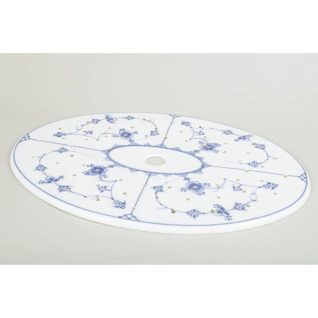 Royal Copenhagen Blue Fluted Plain Fish Strainer Platter, circa 1890. Antique fish strainer platter in the classic Blue...