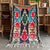 Immerse yourself in the rich tapestry of Moroccan culture with this exquisite Vintage Moroccan Berber Boucherouite Rug....
