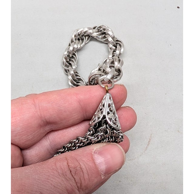 Mid-Century Modern Vintage 1960s Signed Monet Rhodium Plated Tassel Charm Bracelet For Sale - Image 3 of 8