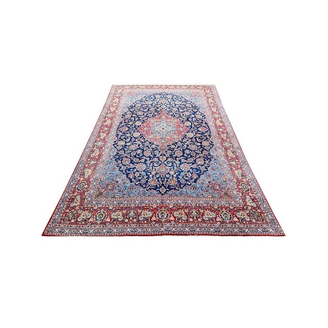 Discover the timeless brilliance of this 10x14 Old Persian Kashan area rug. Hand-knotted in Persia, this rug features a...