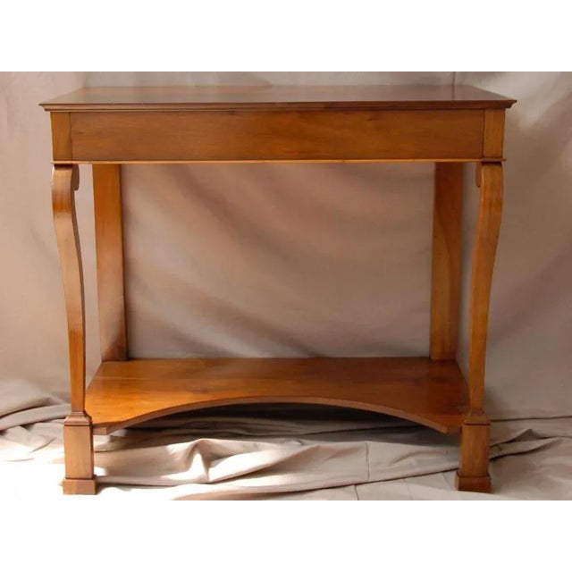 Type Console table Dating 1830 Style Impire Country of origin France Materials Wood, Walnut State of preservation Restored...