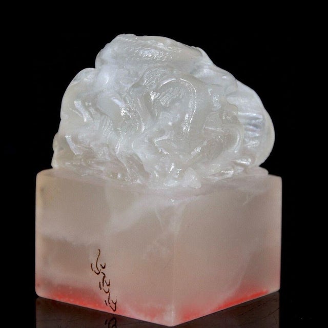 Add a touch of refined elegance to your desk or collection with this finely carved soapstone seal. This traditional...