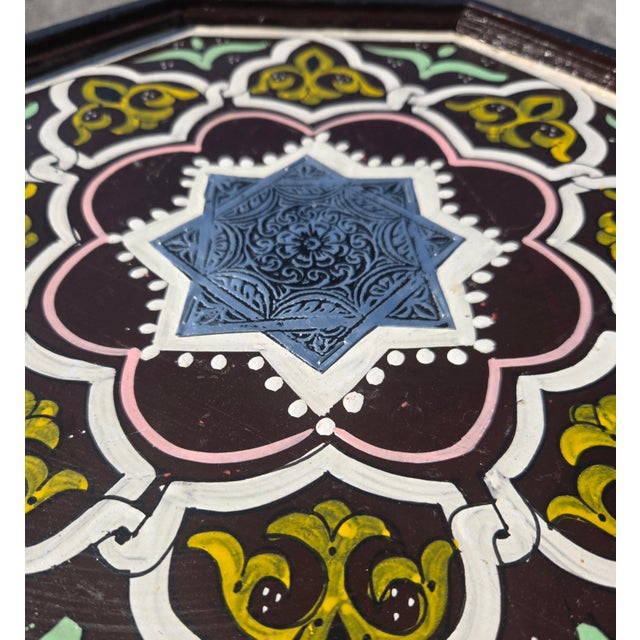 Bring exotic charm and artisan craftsmanship to your home with this beautiful hand-painted Moroccan side table. Featuring...