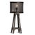 Industrial style table lamp with heavy duty iron frame with studs and iron mesh barrel lamp shade. Antiqued black finish....