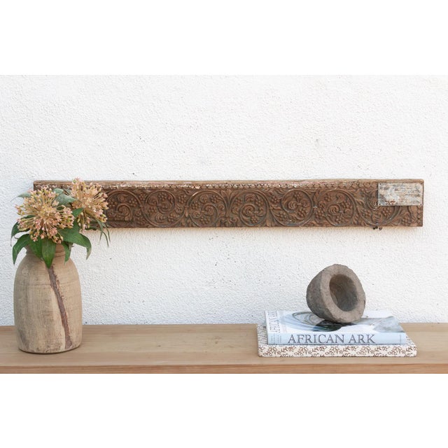 Uncover a piece of history with this authentic architectural carving, salvaged from the structures of 19th-century India....