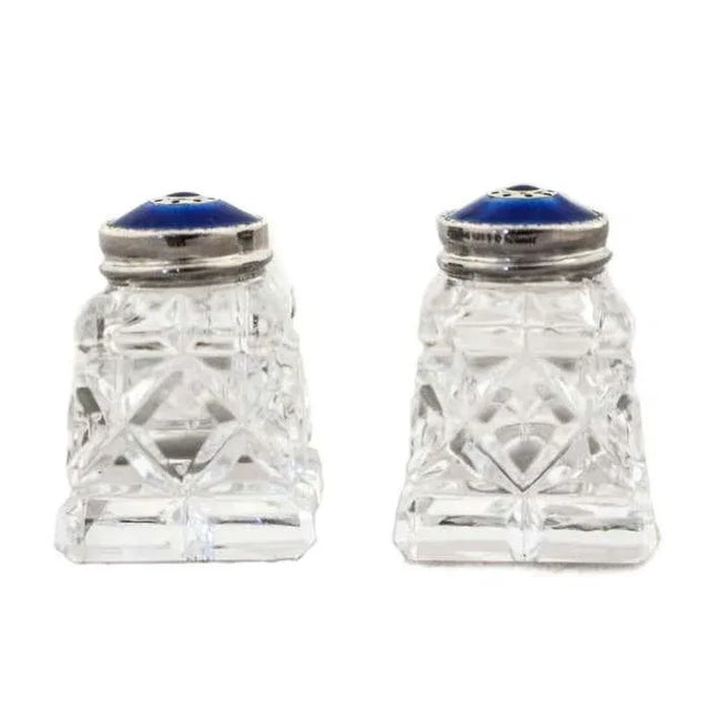 These beautiful sterling silver and royal blue enamel salt shakers come in their original box. Made in Norway in the post...