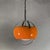 This spherical space age-style chandelier embodies the modernist aesthetic of the 1970s. The piece stands out for its...