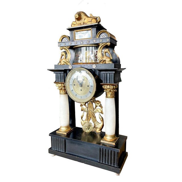 Portal clock Vienna around 1825 with integrated musical mechanism Signed: “A.Olbrich in Wien” and number 215719157....