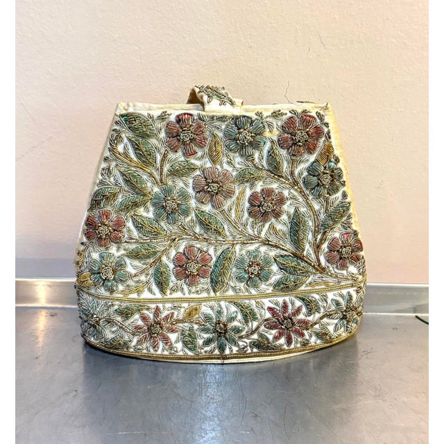 1920s-30s art deco ivory silk/floral beaded evening purse w/ top handle and matching glasses case. Excellent condition....