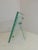 Beautiful and rare table photo frame in Nile green glass. Brass and metal inserts. Hot chiselled edge. A truly beautiful...