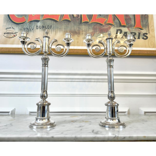 This silver plated Malmaison candelabra, which can hold up to two candles, adds refinement and elegance to any room. One...