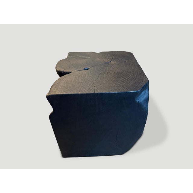 Sculptural teak wood side table hand carved whilst respecting the natural organic wood. Charred, sanded and sealed...