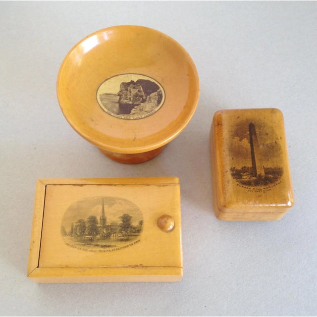 An exceptional three-piece collection of antique Victorian-era Scottish treenware crafted from sycamore. These highly...