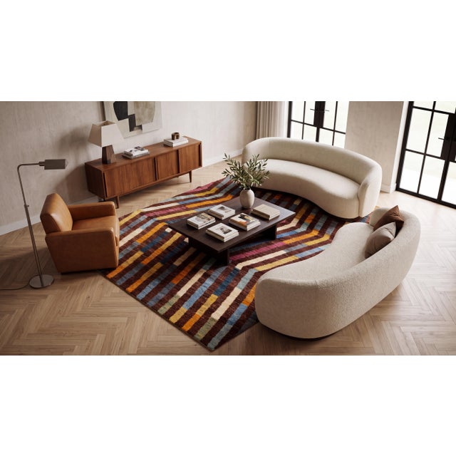 Elevate your space with this striking Modern Moroccan-style hand-woven wool rug, featuring a dynamic multi-colored chevron...