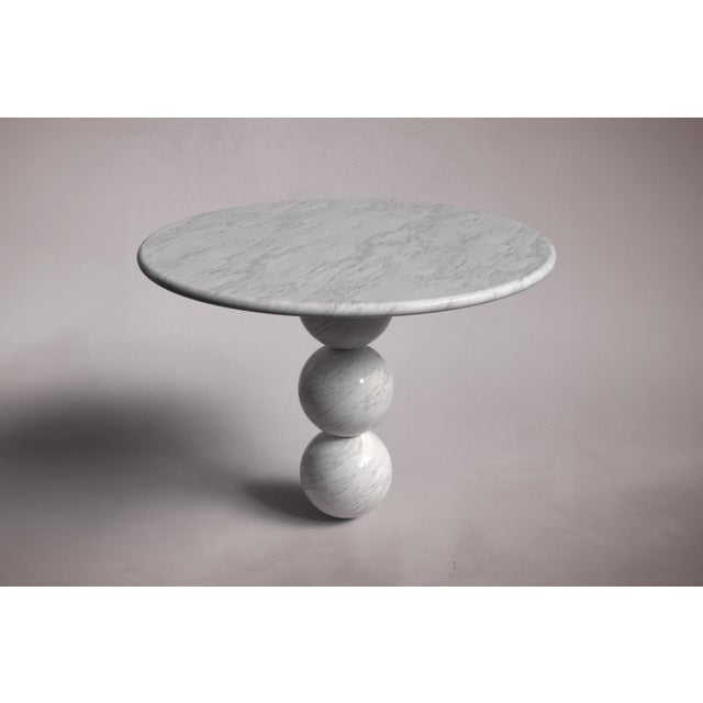 Crafted and hand-finished from Italian Carrara Marble. Italian Carrara Marble can be honed and polished for a matte finish...