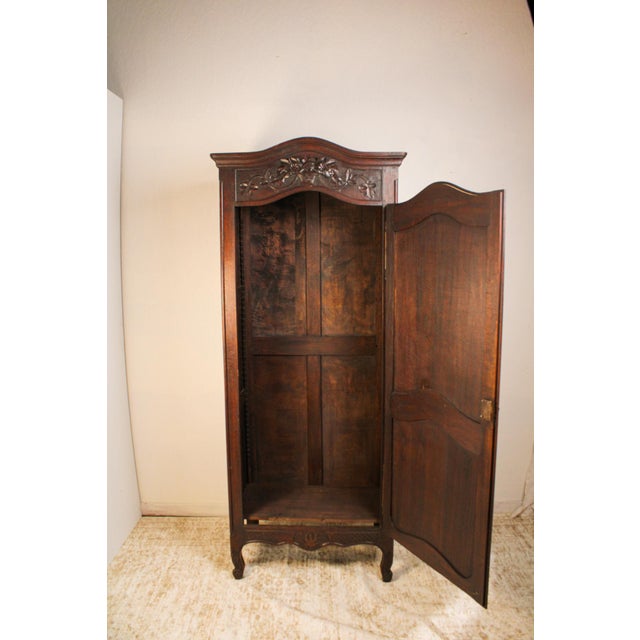 Handcrafted from solid French oak, this antique bonnetière showcases the graceful proportions and understated elegance of...