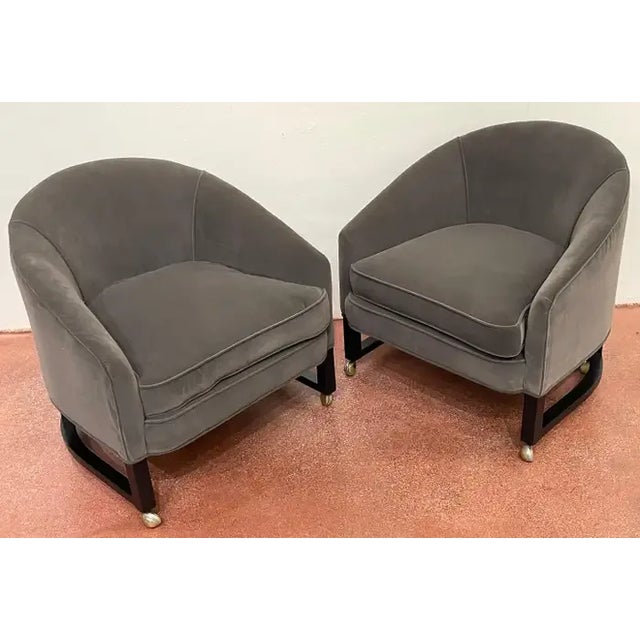 Pair of 1970s Low Profile Barrel Back Club Chairs, Style of Harvey Probber Each one of sleek proportions, raised on...