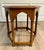 This charming vintage side table from the 1960-70s features a distinctive hexagonal form with geometric legs ending in...