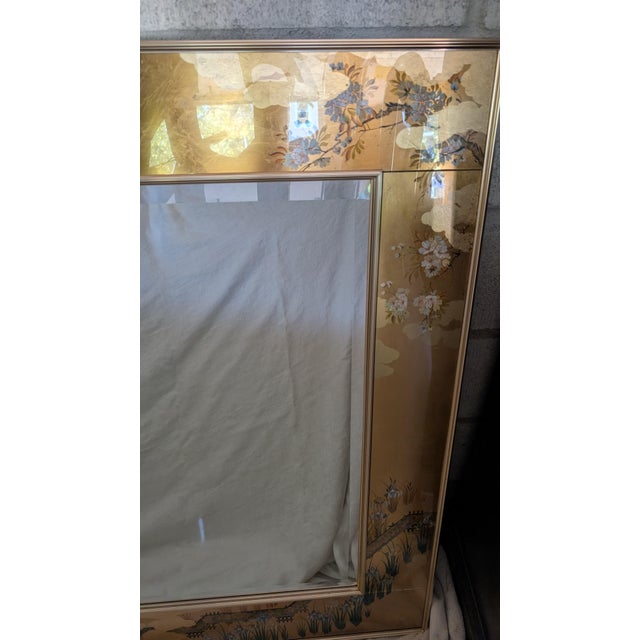 This is a fantastic vintage artists signed La Barge rose gold colored brass frame hanging wall mirror with shown frame of...