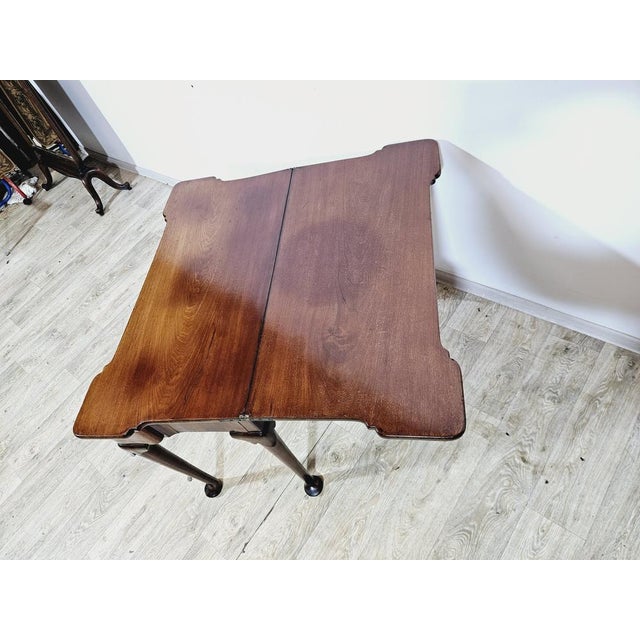 For sale I am offering a unique, antique game table (so-called card table), which, when folded, serves as an elegant wall...