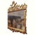 On offer is a spectacular Victorian era, Baroque-style floral carved gilt wood mirror. At 44-inches high, this piece can...