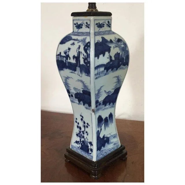 Antique 19th c. Chinese blue and white porcelain square baluster shaped vase now mounted as a lamp with custom wood base...