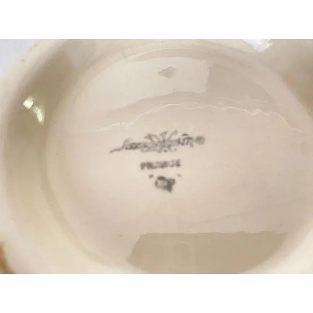 Ironstone white bowl, with a lid. It has been done by Sarreguemines, in France during the 19th Century. This piece is...