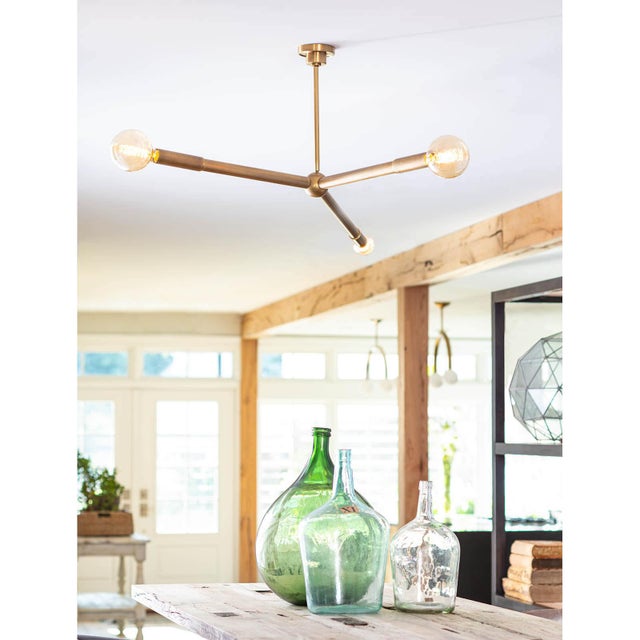 The Talon Chandelier exudes modern form and function. Its artfully suspended arms can be angled up or down from its...