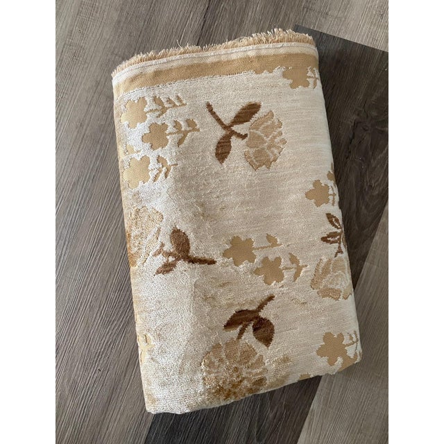 Velveteen floral print. Brown with a tan background (approx. Pantone 482) Shimmery in some light Cotton Upholstery grade...