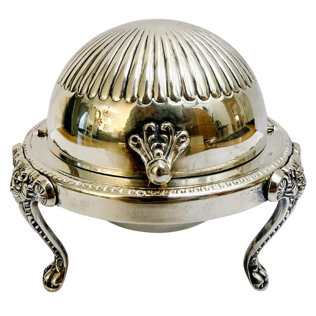 A classic American roll-top serving dish with a beautifully revolving chased dome lid by FB Rogers Silver Co. This...