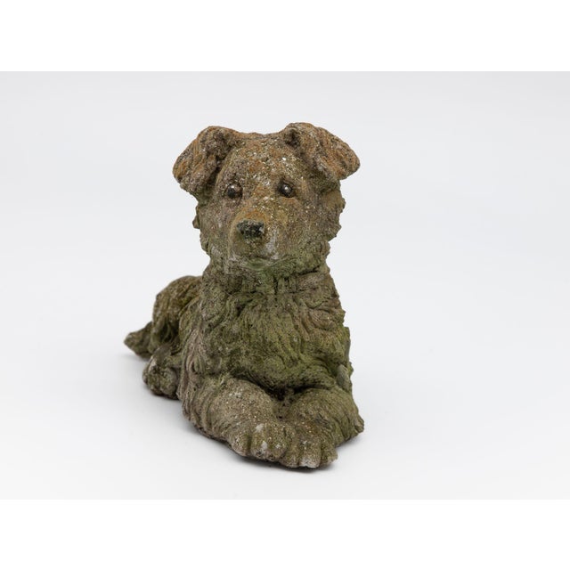 This heartwarming mid-20th century concrete dog terrier garden ornament exudes an authentic vintage charm that adds a...