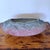 Large pink and blue raku centerpiece bowl. Done in the traditional raku style by famed American artist Tony Evans. Signed...