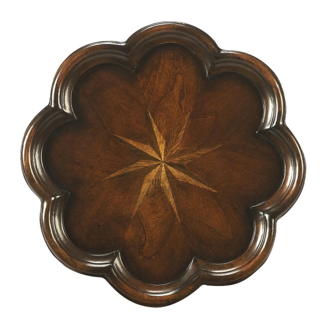 Designed to be a perfect complement for a small space in virtually any room; this elegant table is crafted from solid...