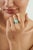 This Minimalist 4.7 Ct Oval Turquoise Bezel Set Solitaire Ring is crafted in 925 sterling silver, featuring a 4.7-carat...
