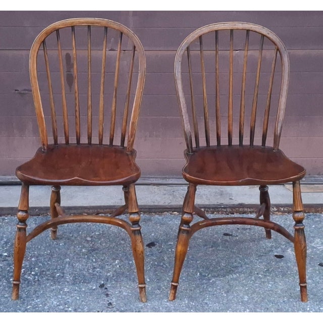 A Pair of English Windsor Style stained Oak Side Chairs. Solid and sturdy. For decorative purpose and as well as for...