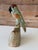 A charming vintage Peruvian hand-carved gemstone parrot sculpture featuring two birds perched atop a carved stone base....
