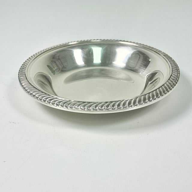 This Mid-Century Silverplated Wine Coaster is from Reed & Barton and features a pretty turned rope rim. It’s perfect in...