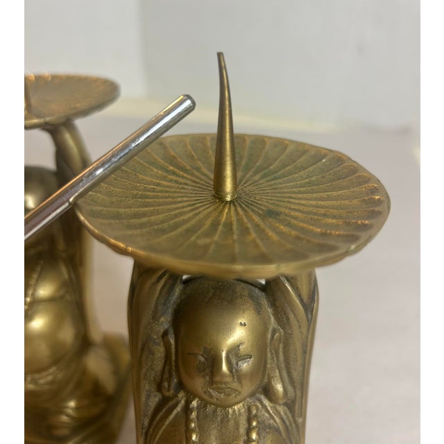 Pair of Brass Buddha Figures Candle Holders Hindu India Approximately 7.25” including spike (about 6” without the spike)....