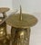 Pair of Brass Buddha Figures Candle Holders Hindu India Approximately 7.25” including spike (about 6” without the spike)....