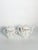 Elegant vintage French tea service comprising a teapot and matching covered sugar bowl in white porcelain. Both pieces are...