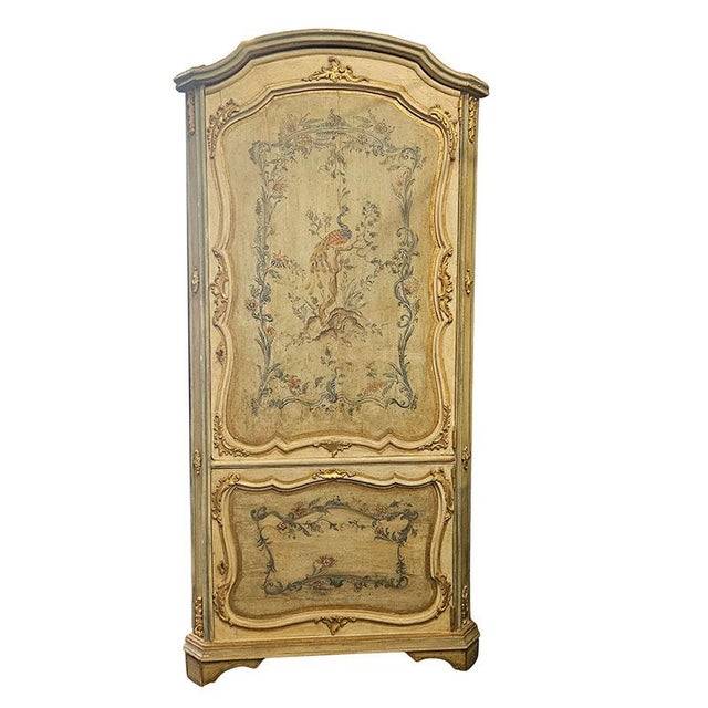 Lacquered and gilded wood corner cabinet decorated with birds, plant and floral motifs, two-door front, signs of wear....