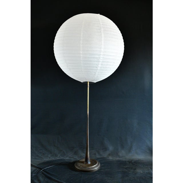Made with an antique floor lamp base and a vintage boat horn, this floor lamp stands 67 inches tall and 30 inches wide...