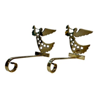 Vintage Late 20th Century Polished Brass Angel Stocking Holders With Bodice of Pierced Stars and Playing Horn - a Pair For Sale