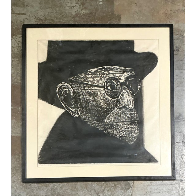 This vintage framed woodcut portrait of Sigmund Freud offers a compelling fusion of fine art and intellectual history....