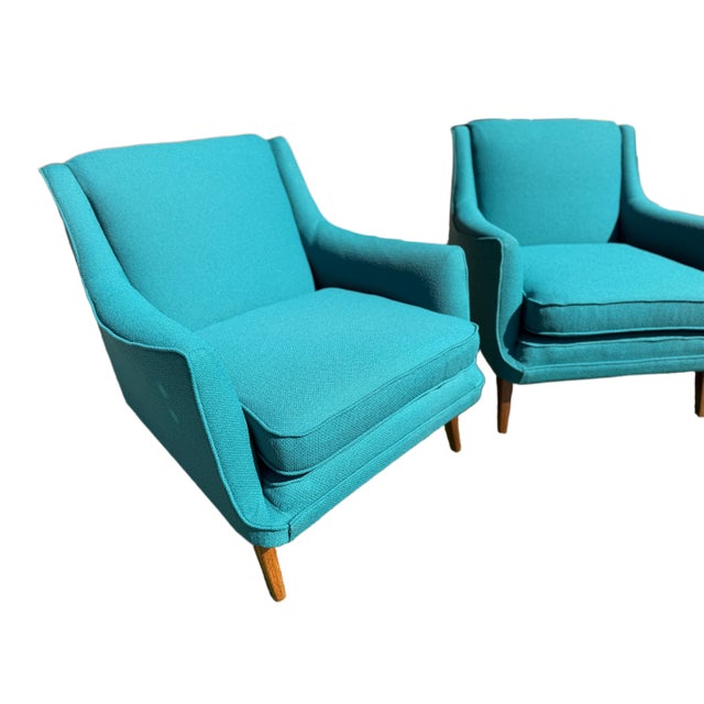 This set of 1950's chairs has had a full restoration job: all new, high-density foam throughout, professionally...