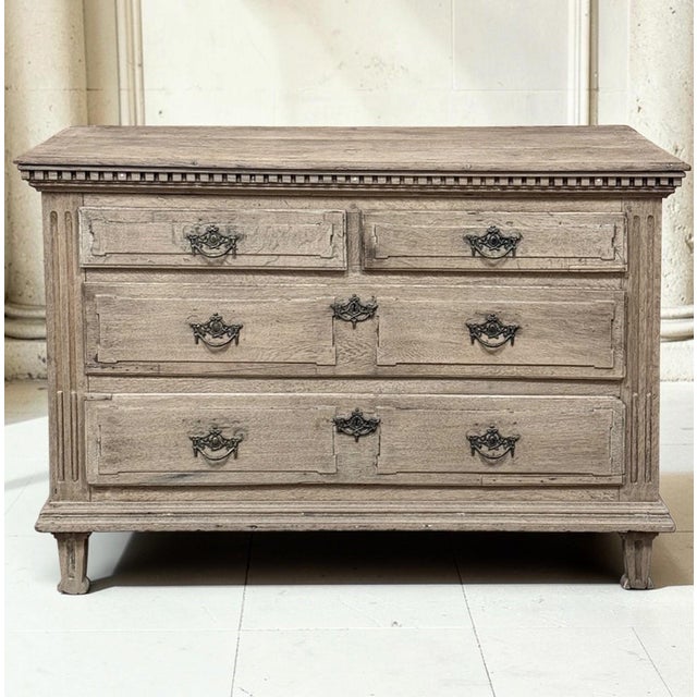 18th Century French Neoclassical Chest of Drawers in Stripped Oak will make a splendid addition to your timeless decor!...