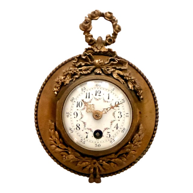 Antique French Gilt Bronze Cartel Clock With Floral Enamel Dial For Sale