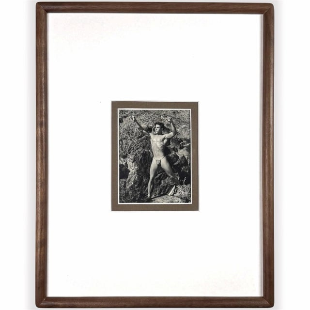 A matched pair of original 1951 male physique photographs by Bruce of Los Angeles, preserved together more than seventy...
